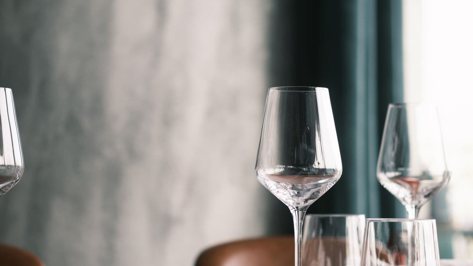 Set table with wine glasses at an upscale restaurant